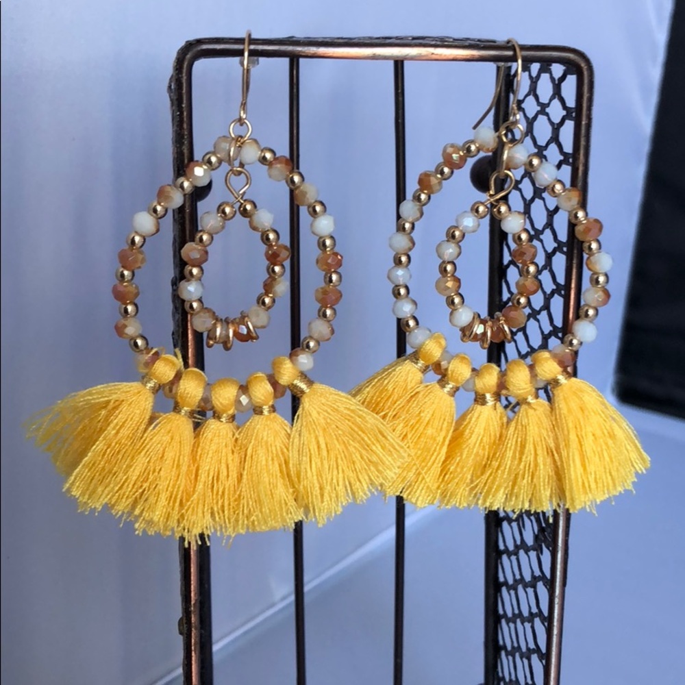 Round with yellow tassels earrings